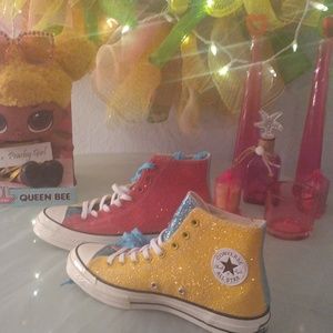 A custom multi colored Converse high top sneaker with glitter sequence and bling